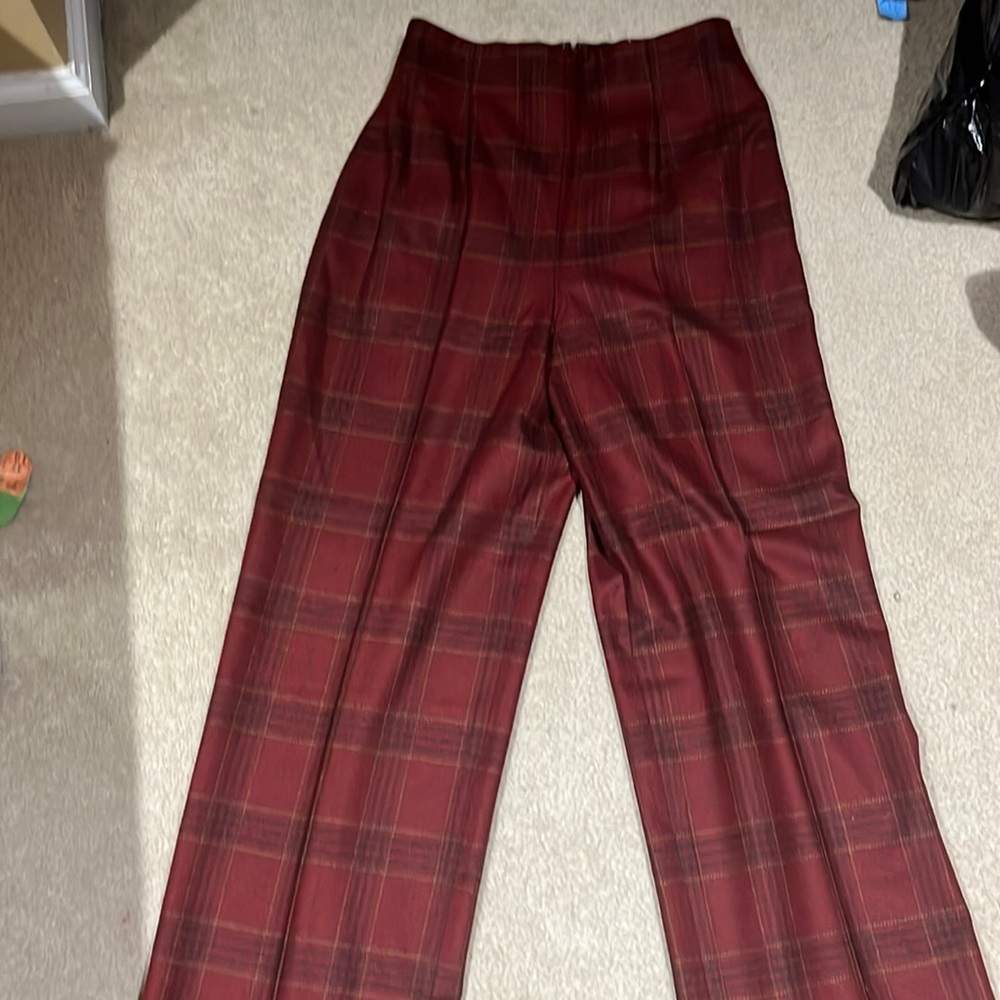 Made of wool and cashmere.  Never worn, they run more like a size 4.  Very chic.